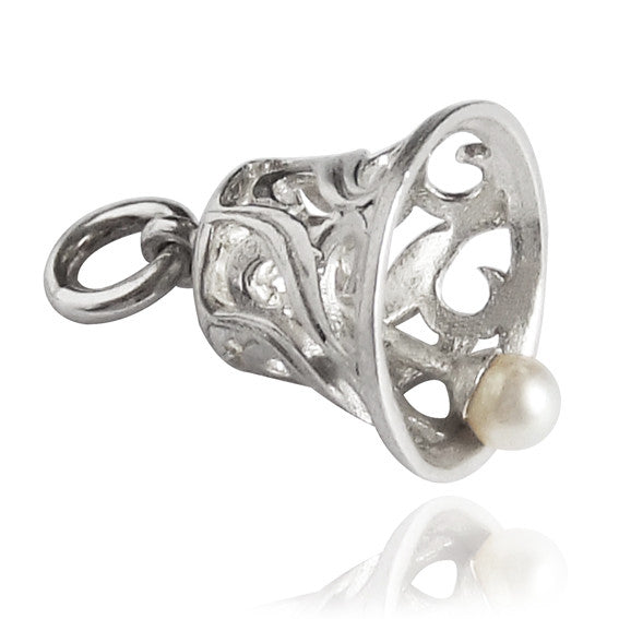 sterling silver bell charm with pearl clapper against a white background