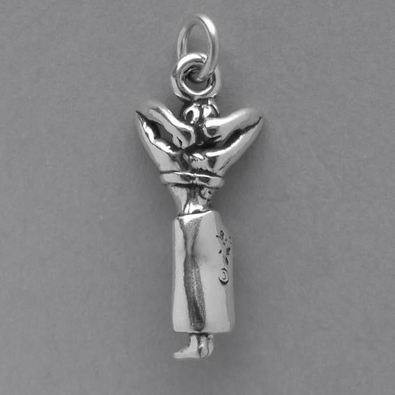 belly dancer charm in sterling silver on grey background
