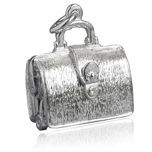 Sterling silver briefcase charm which opens to lingerie on a white background