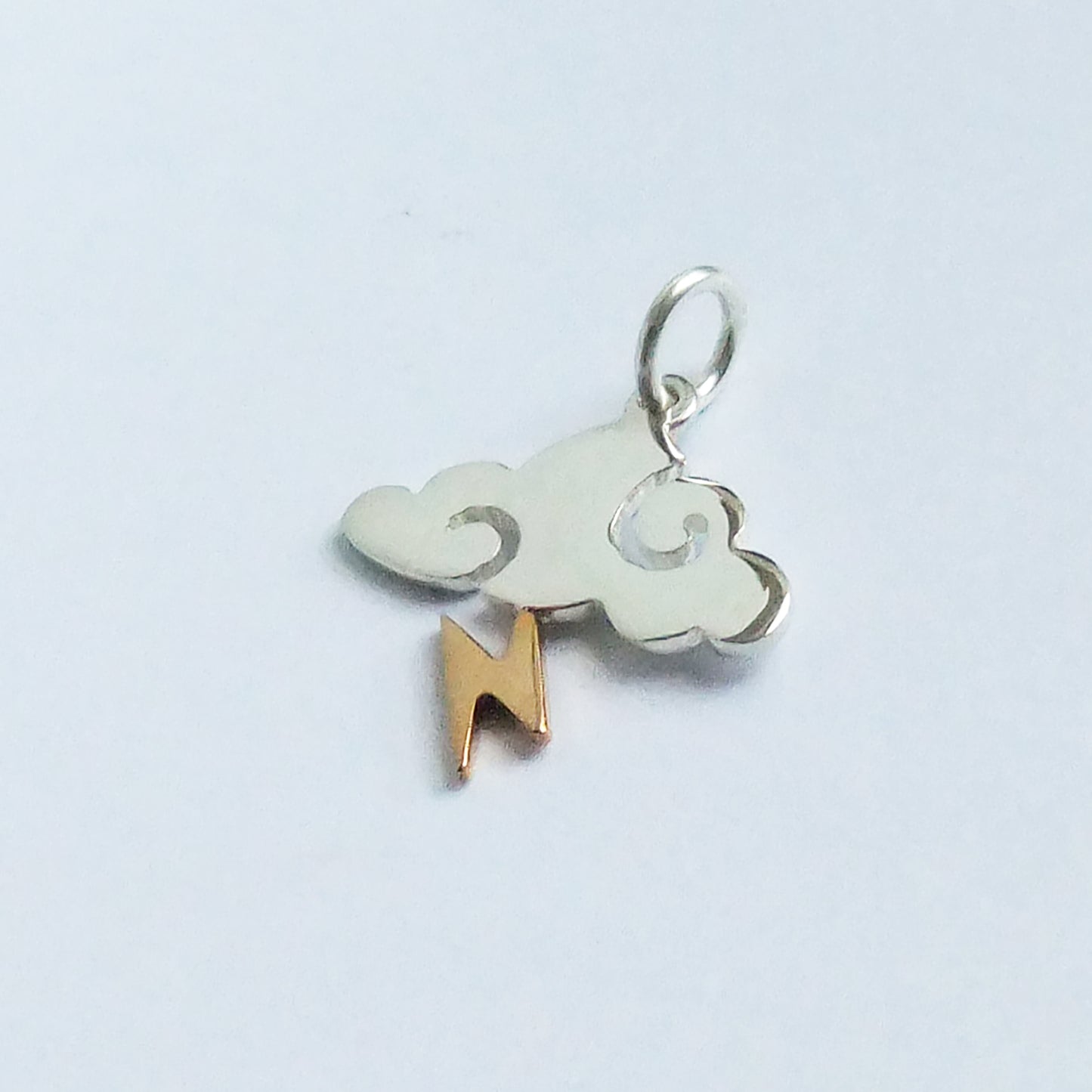 sterling silver and bronze storm cloud charm with lightning