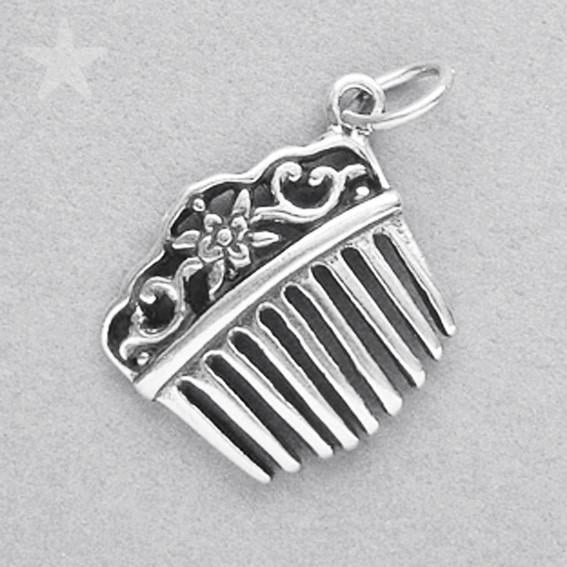 silver hair comb charm on a grey background