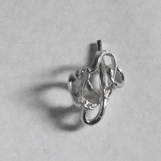 Sterling silver diving mask charm on a grey background