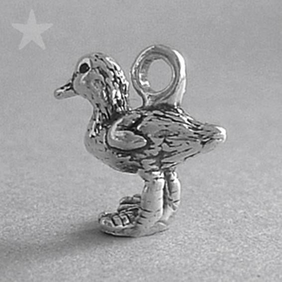 Sterling Silver Duckling Charm on a grey background