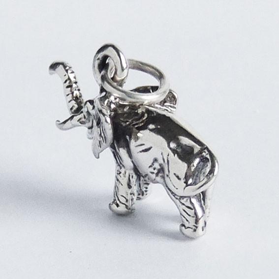 Sterling silver elephant charm on a white background