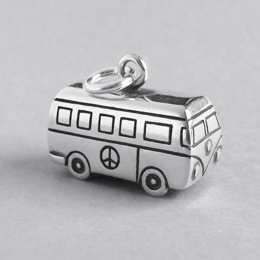 silver kombi charm on grey background