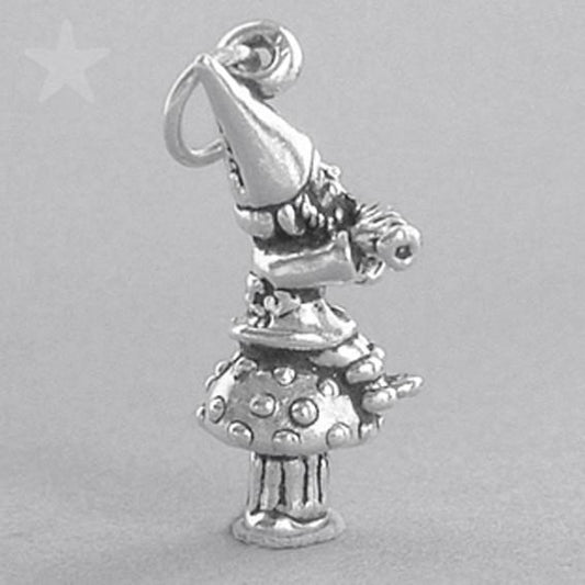 Sterling silver elf charm on a grey background