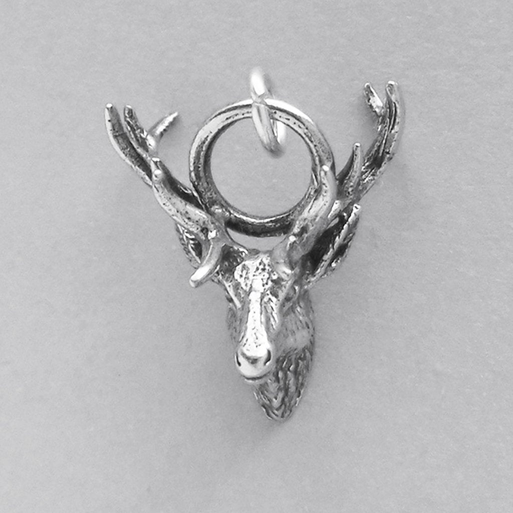 silver reindeer head charm front view on grey background