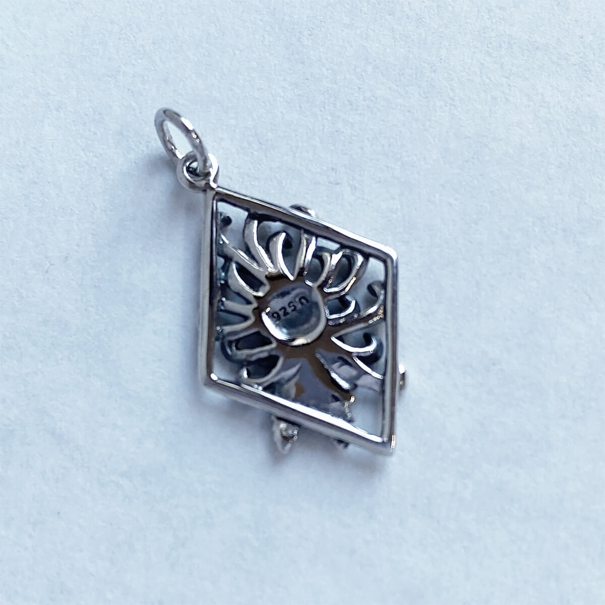 Sterling silver flower charm from Charmarama Charms