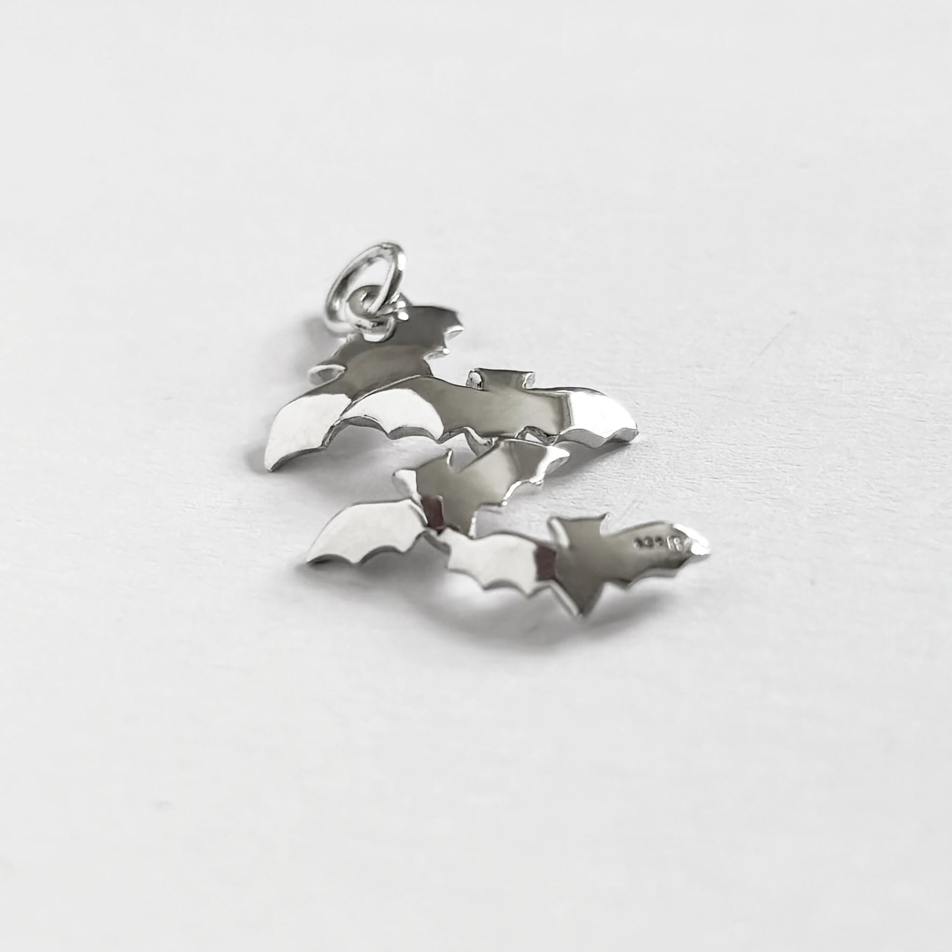 Flock of bats charm sterling silver pendant