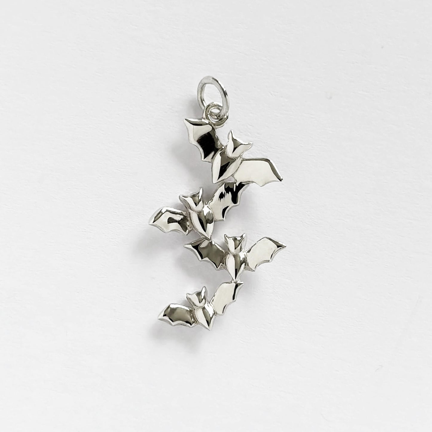 Flying bats charm sterling silver pendant