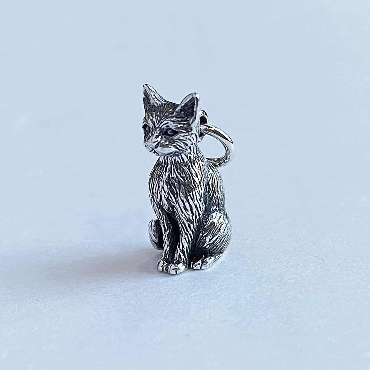 Realistic Sterling silver sitting cat charm from Charmarama charms