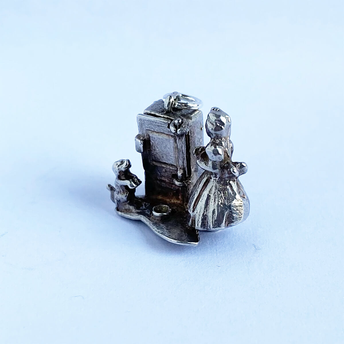 Vintage silver Old Mother Hubbard and dog nursery rhyme charm