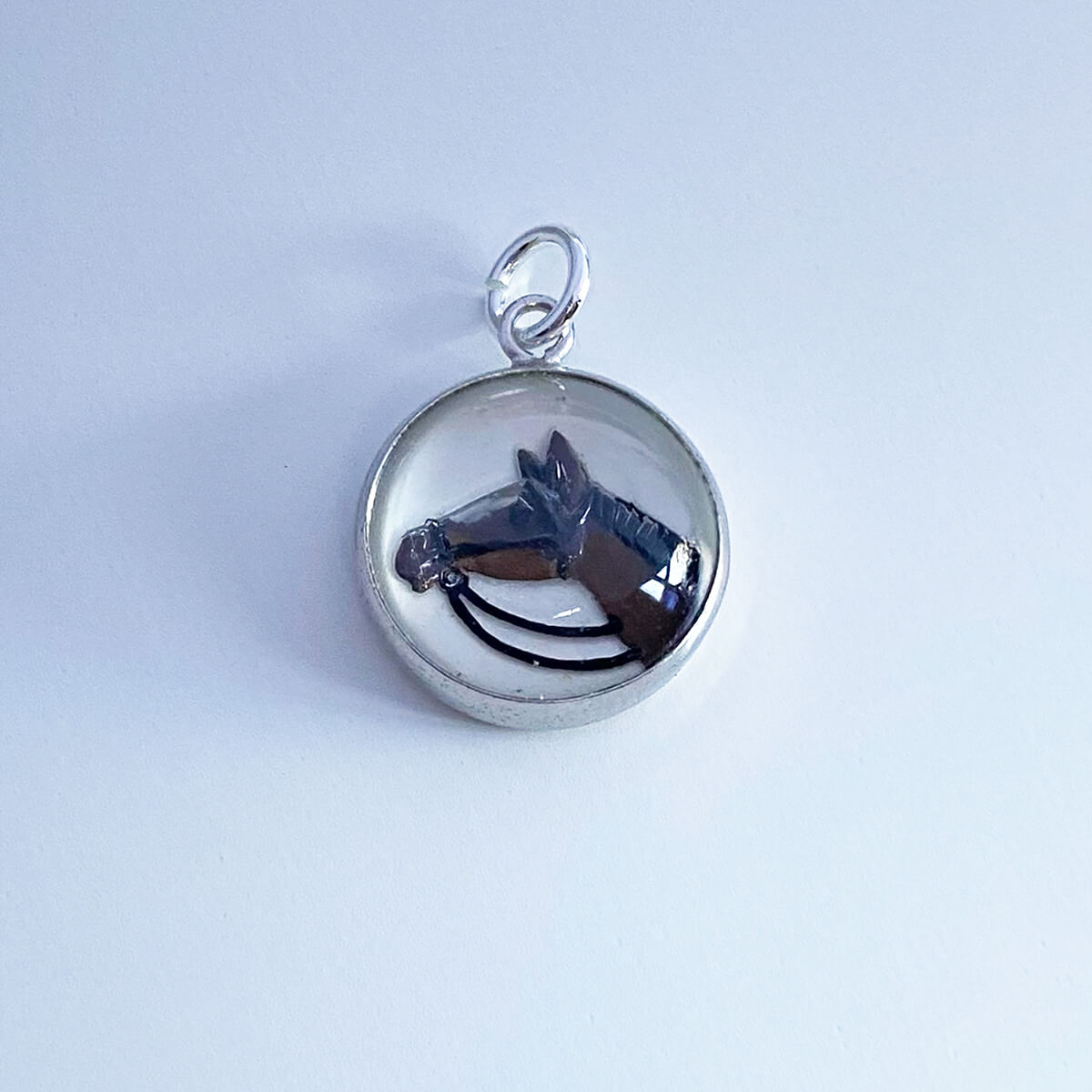 Vintage intaglio crystal horse charm sterling silver from Charmarama