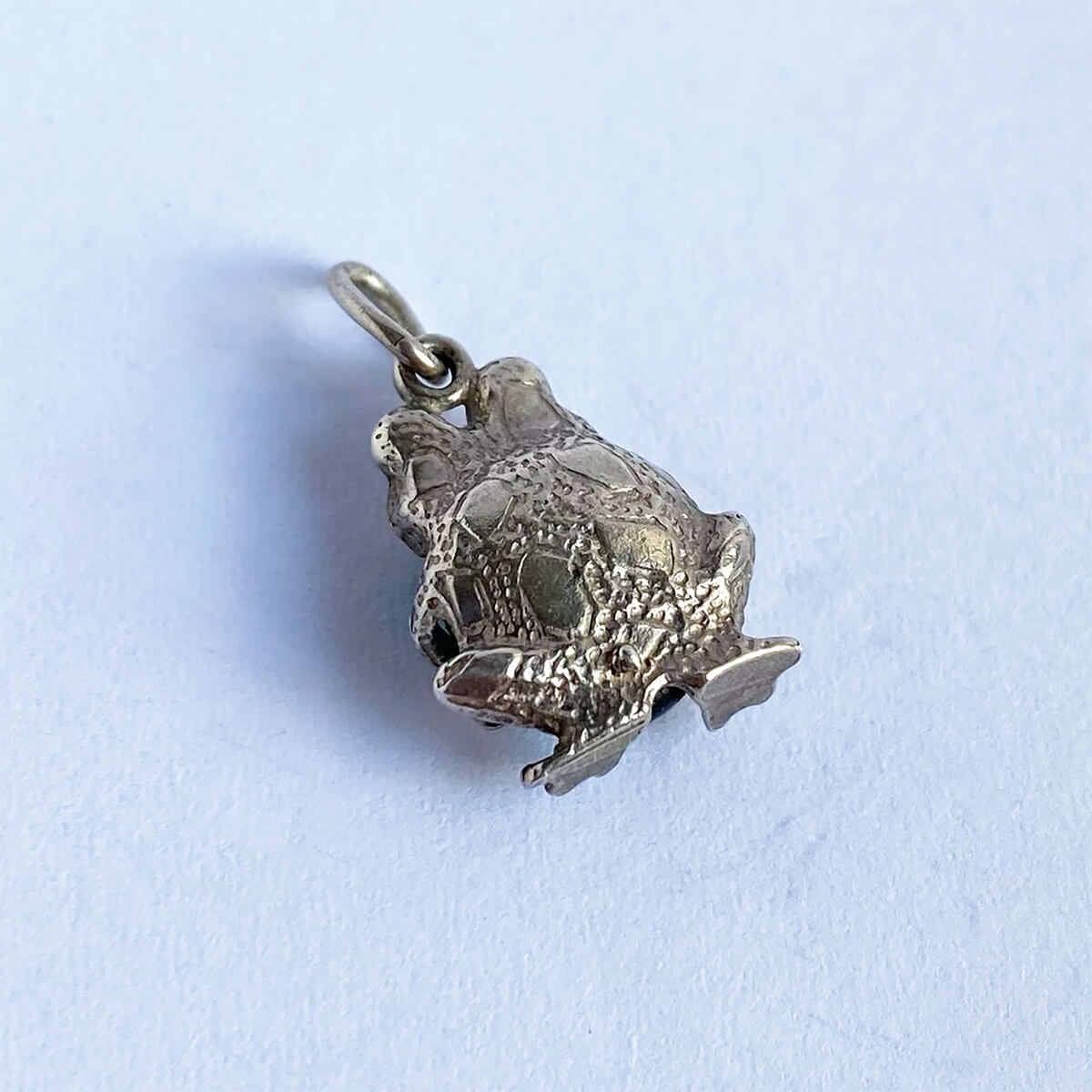 Vintage silver frog charm with green crystal