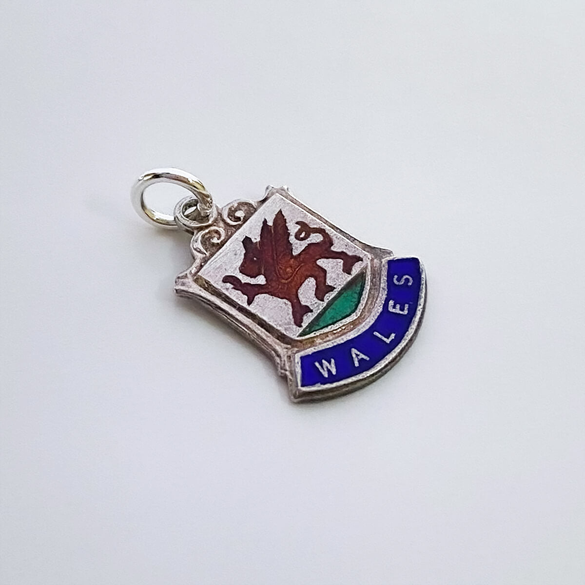 Vintage silver and enamel Welsh shield charm