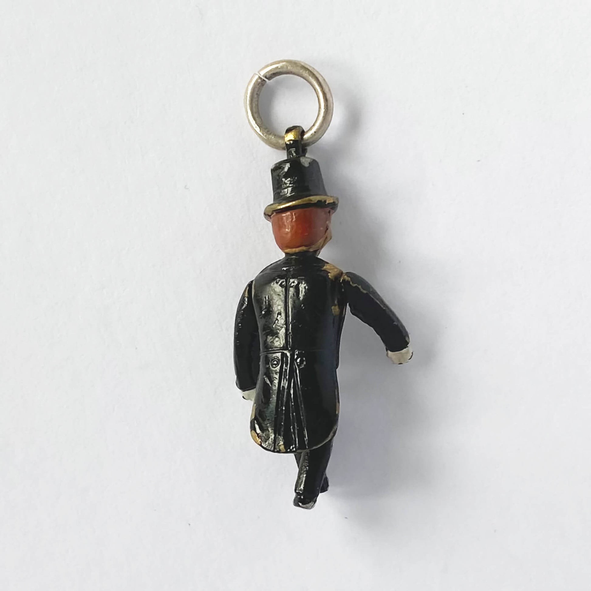 Charlie McCarthy ventriloquist dummy charm with enamel on a white background