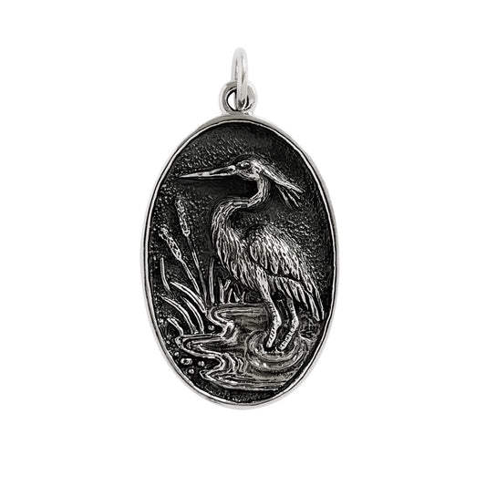 Sterling silver heron in oval frame charm pendant from Charmarama