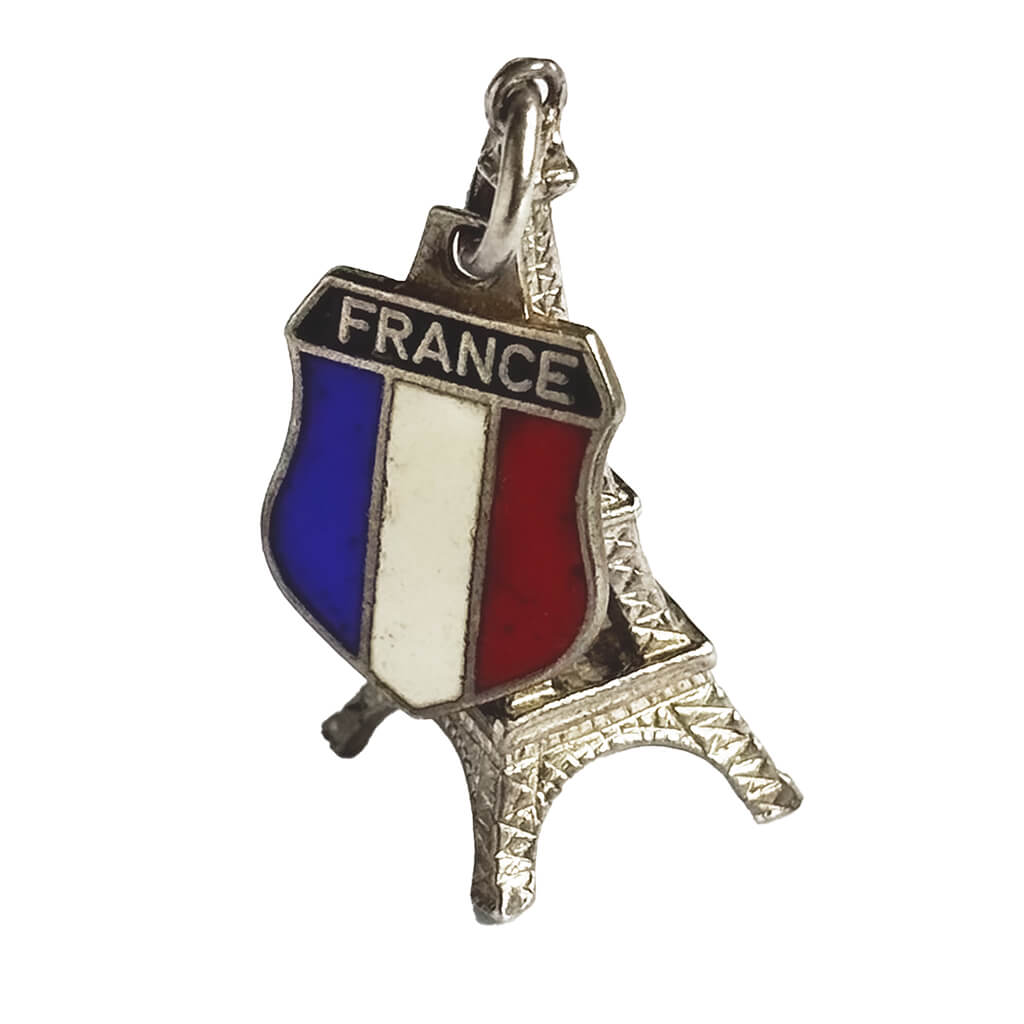 Pendant with French flag design and Eiffel Tower on a white background