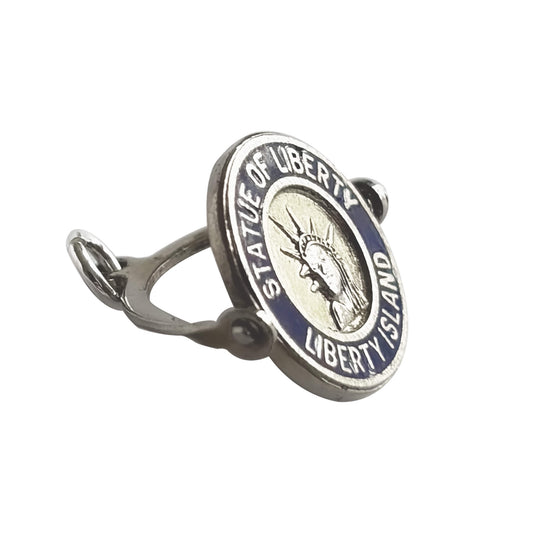 Statue of Liberty spinning disc on a ring with blue border