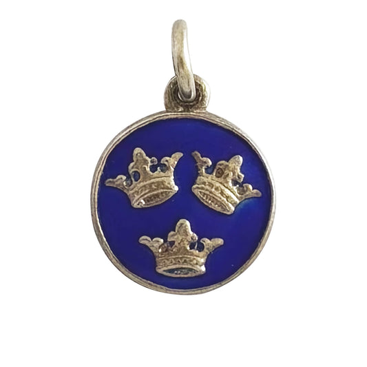 Round pendant with three crowns on a blue background, the national symbol of Sweden