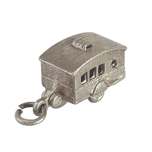 Vintage silver caravan charm opens to enamelled furniture