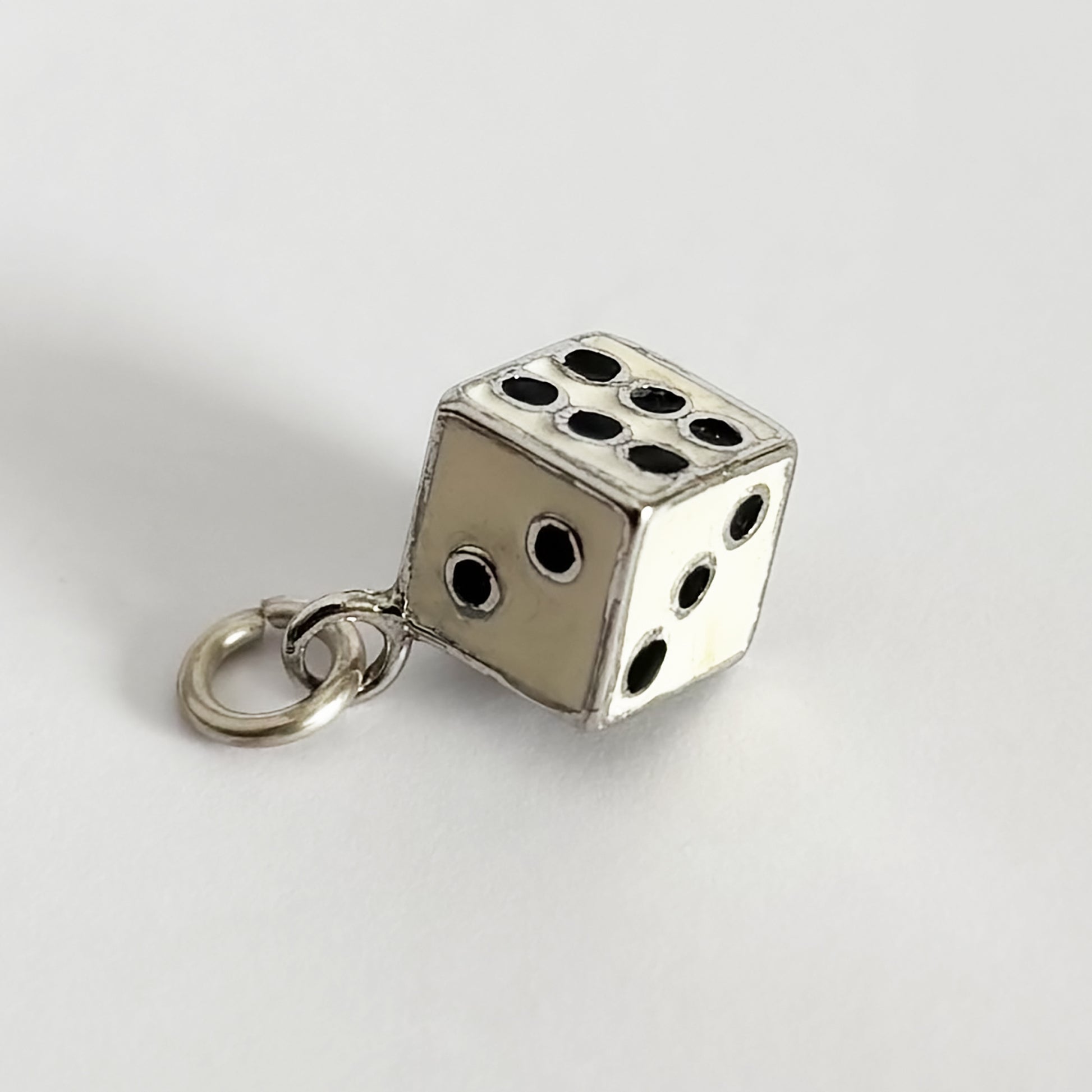 Vintage dice pendant in sterling silver white enamel with black dots