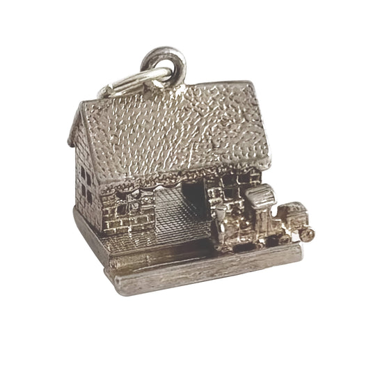 A vintage silver train in station charm on a white background