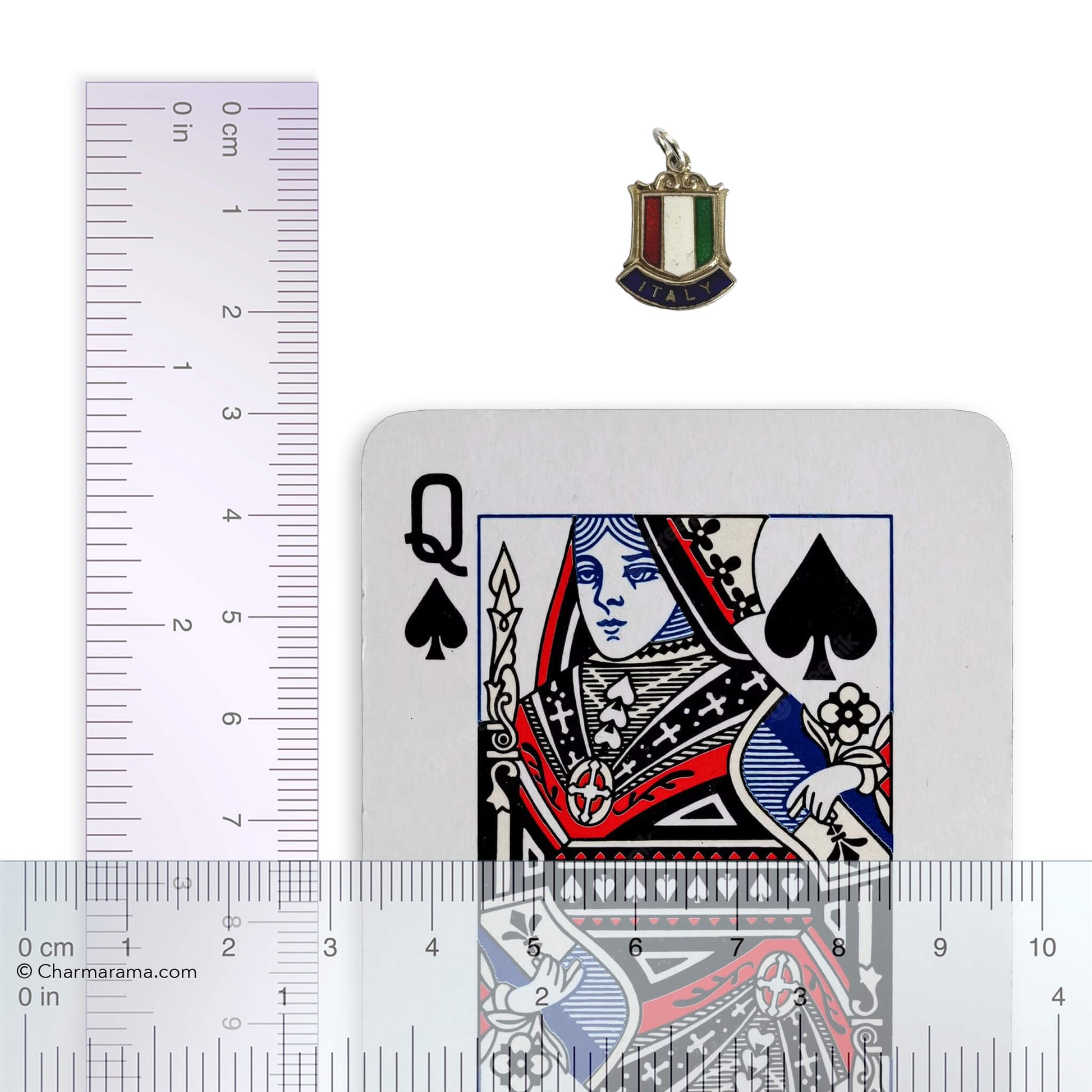 Sterling silver Italy flag travel shield charm with playing card and ruler on a white background