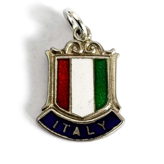 Sterling silver Italy flag travel shield charm on a white background