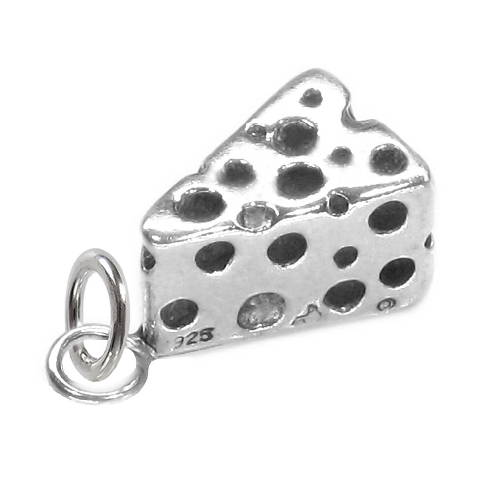 A wedge of Swiss cheese charm in sterling silver
