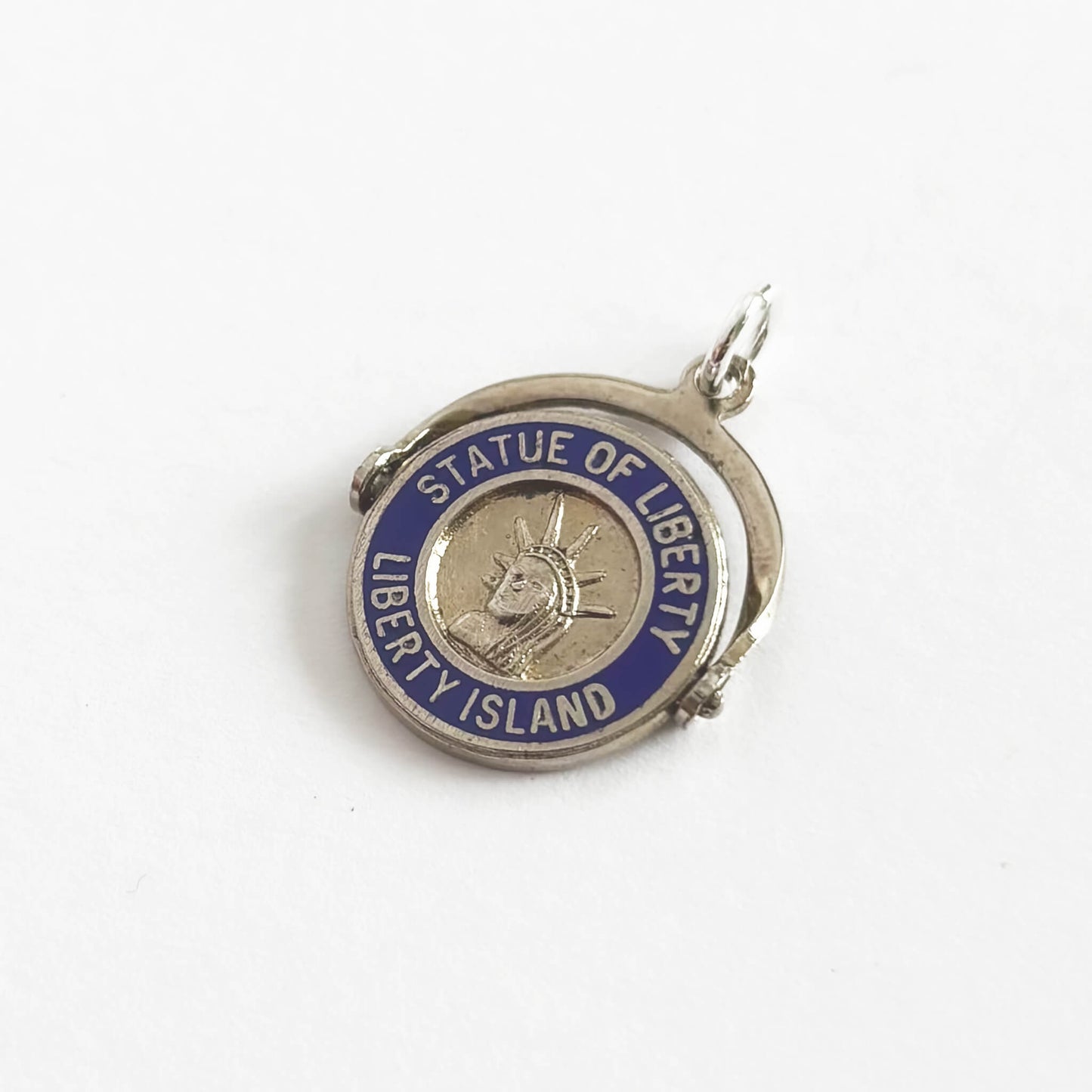 Statue of Liberty pendant on a white background