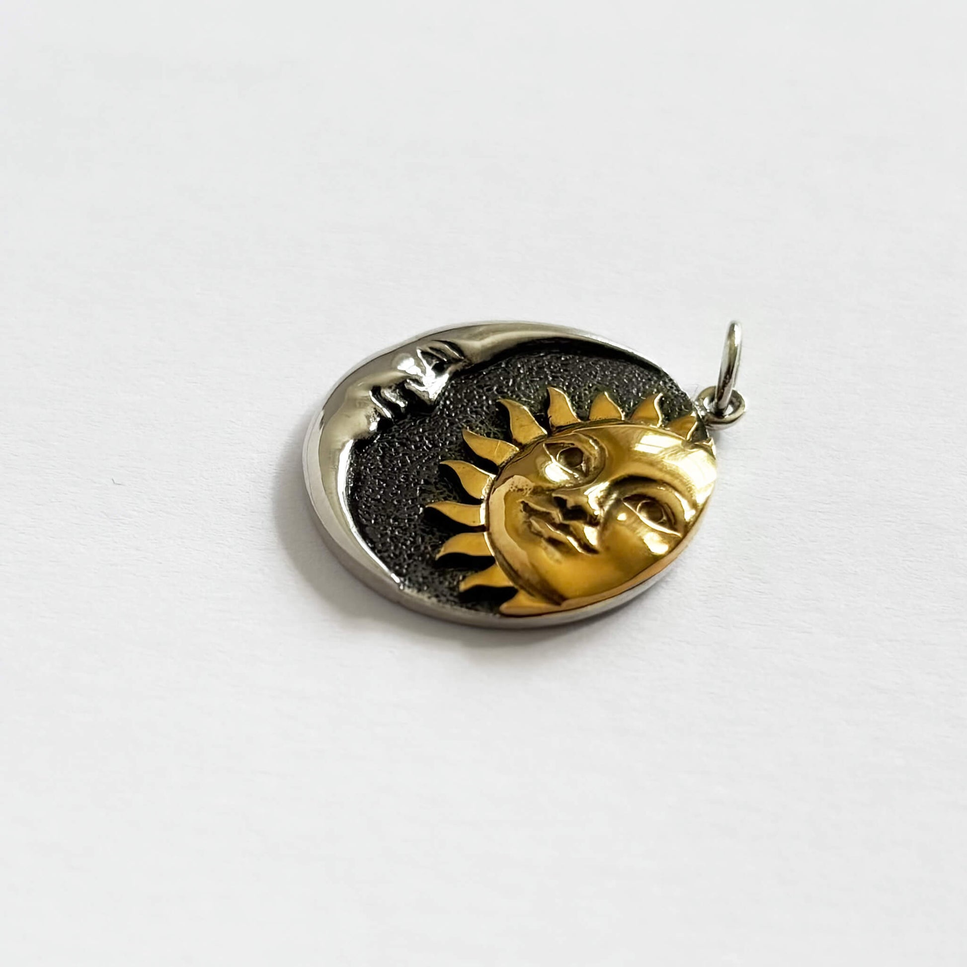 sun and moon charm sterling silver and bronze