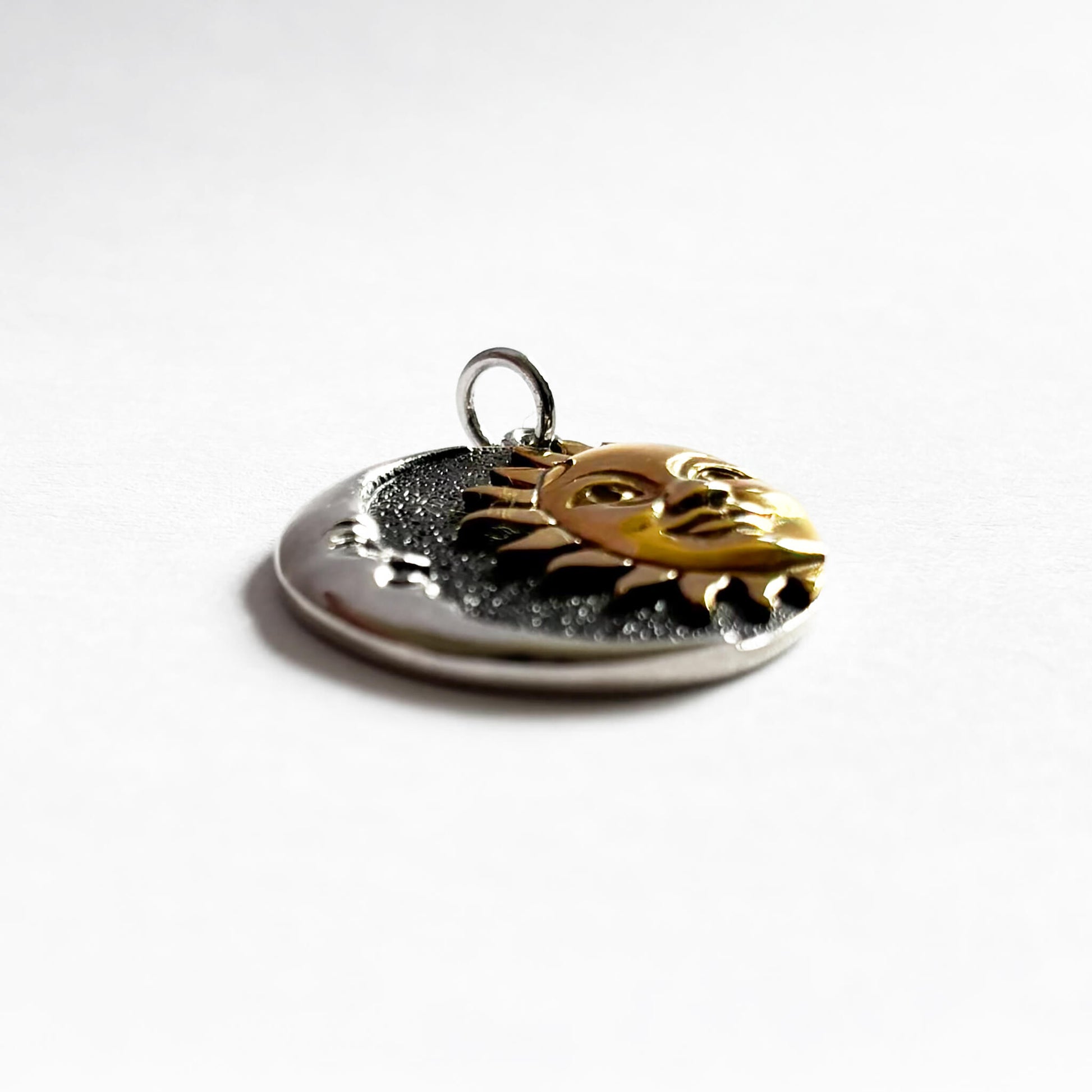 Sterling silver and bronze pendant sun and moon charm