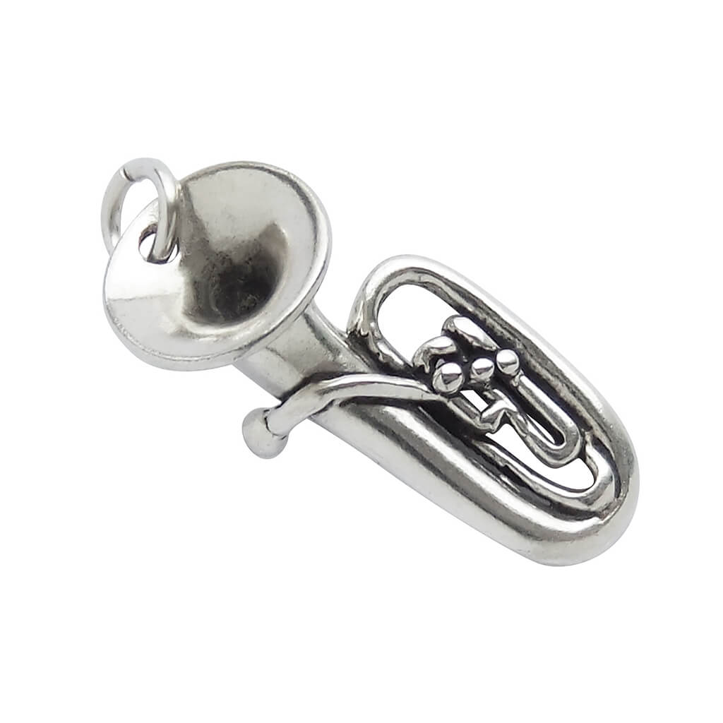 Silver tuba charm on a white background