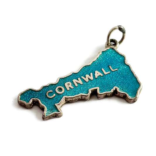 A vintage sterling silver and blue enamel Cornwall charm
