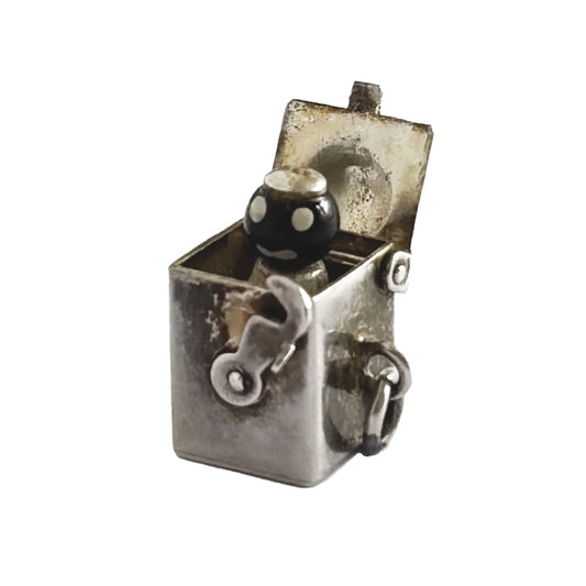 Vintage sterling silver Jack-in-the-box charm, open to reveal tiny figure