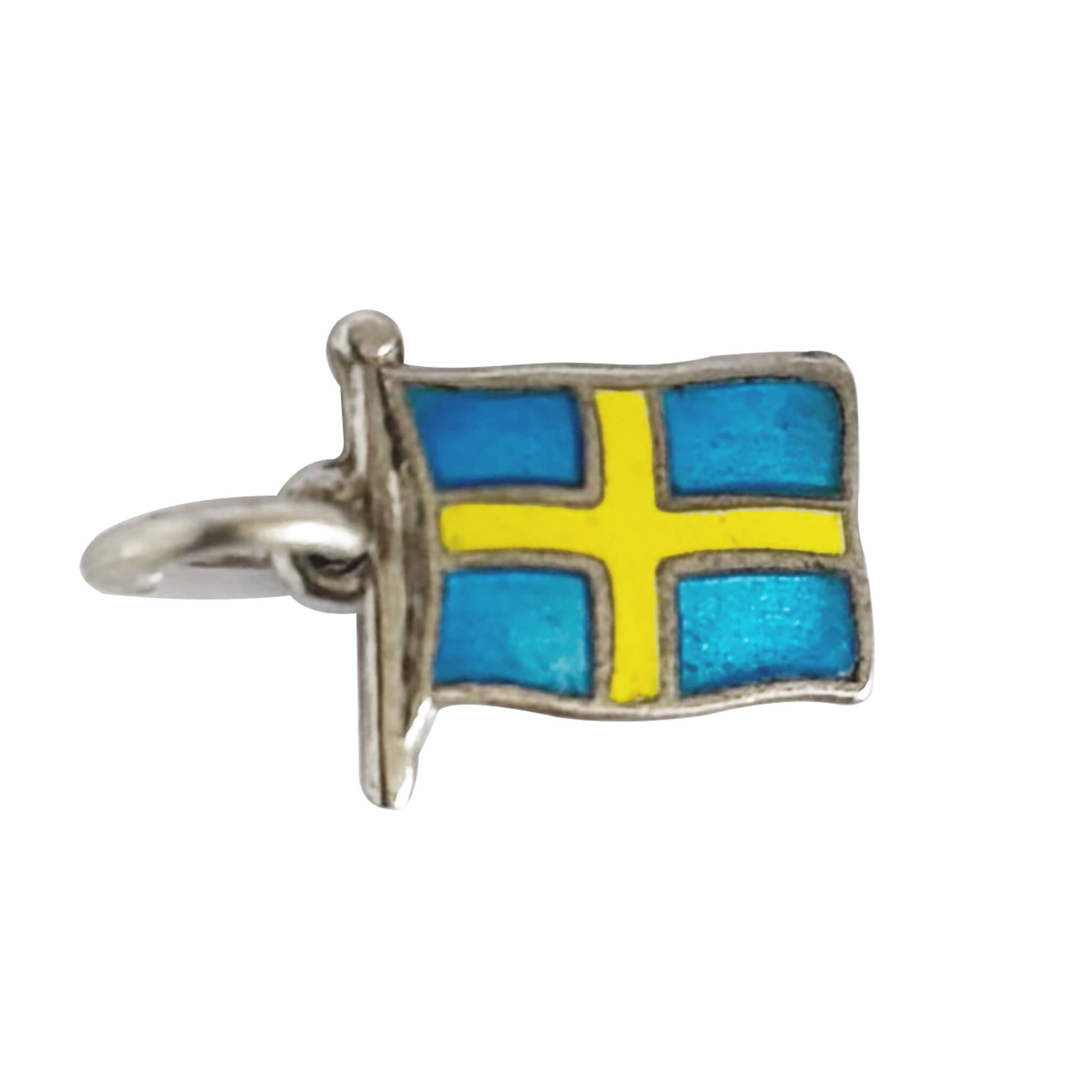 Silver charm with a Swedish flag design on a white background