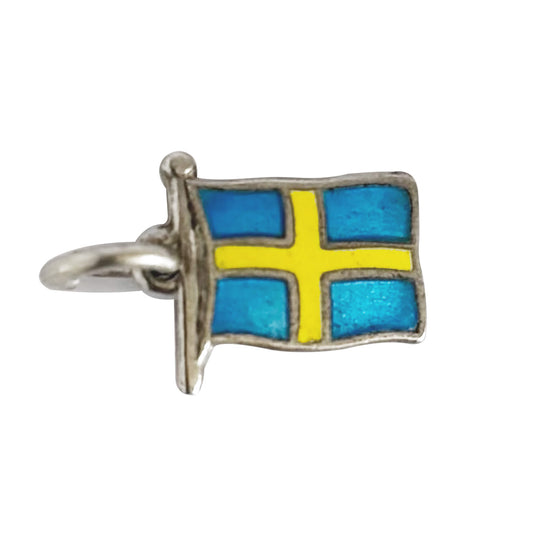 Silver charm with a Swedish flag design on a white background