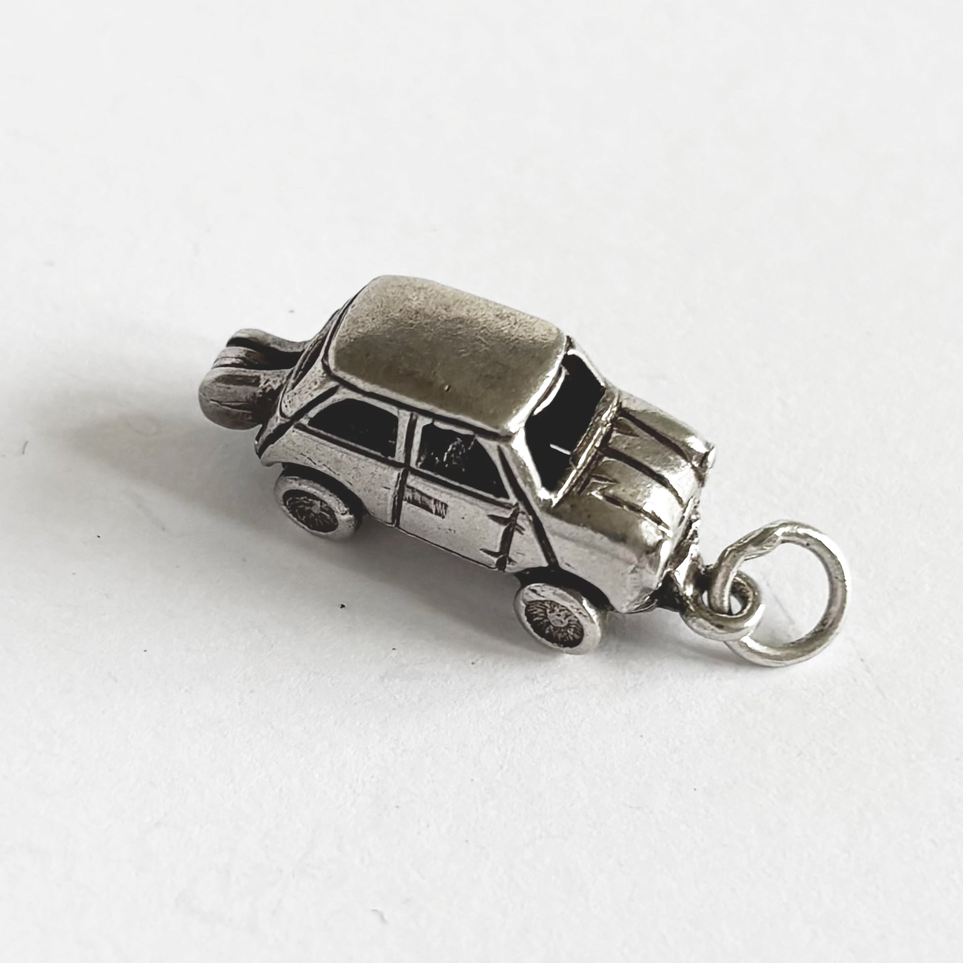 Vintage sterling silver opening mini car charm made by CHIM