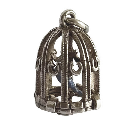 Silver birdcage charm with a bird inside on a white background