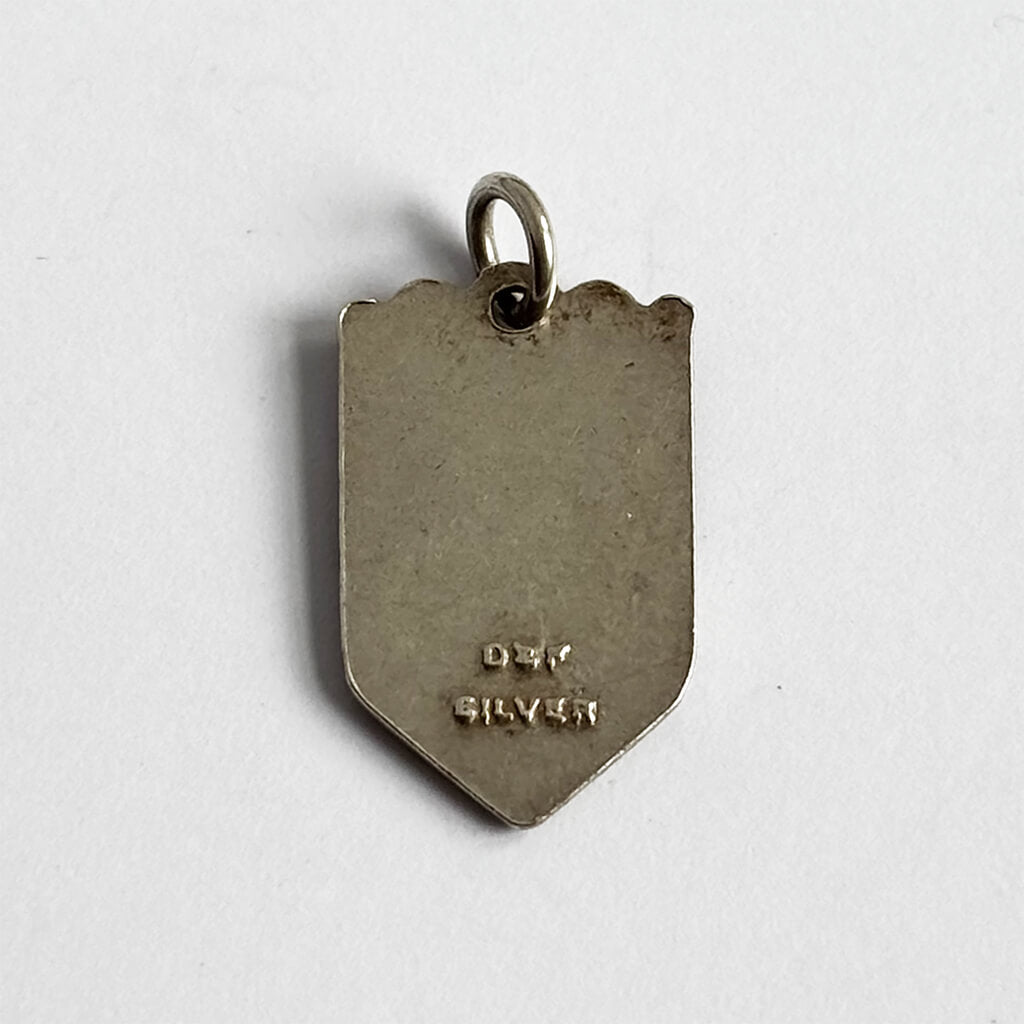 Silver pendant with '925 Silver' stamp on a white background