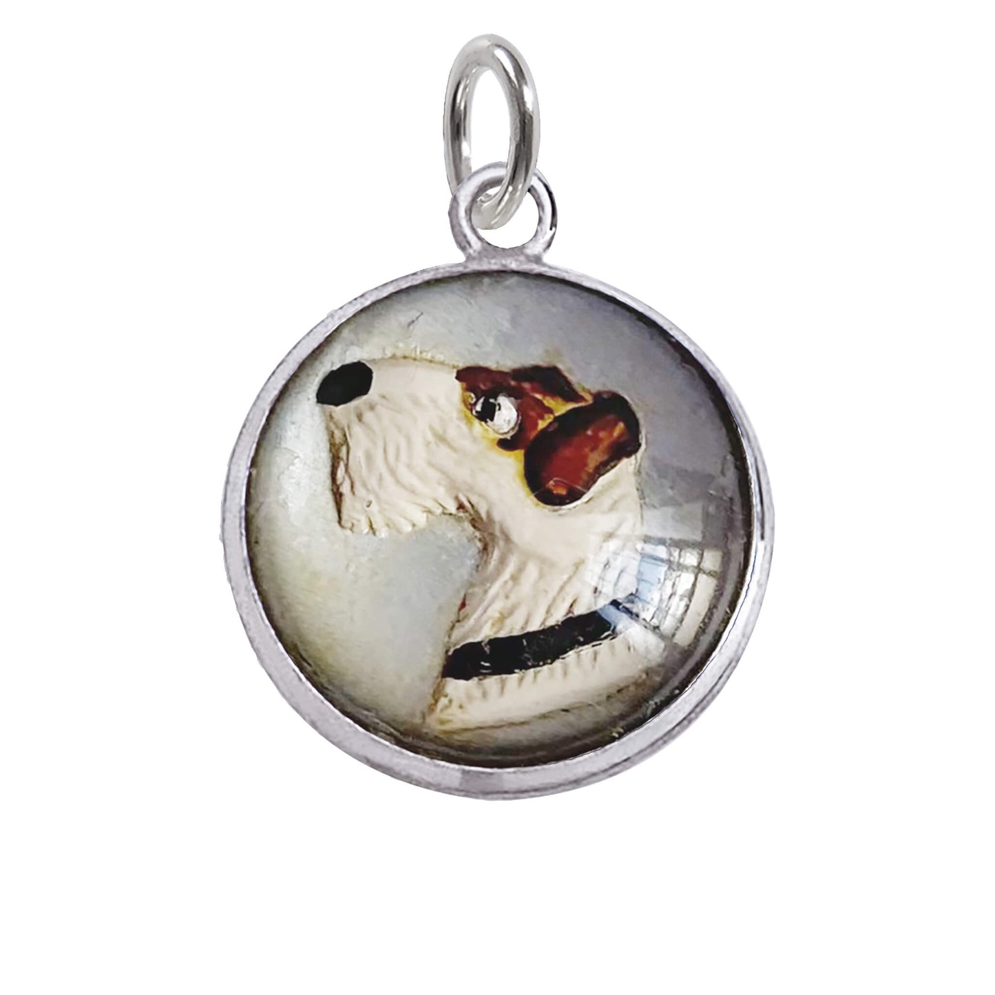 Pendant with a dog's face design on a white background