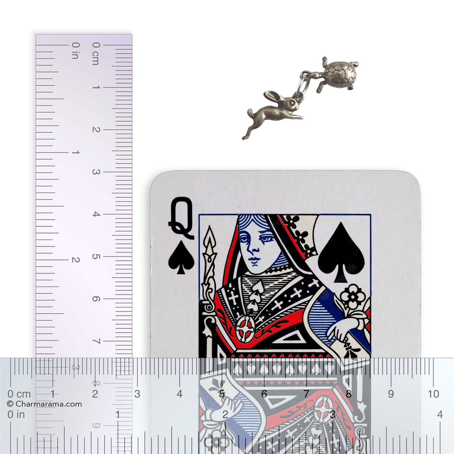 A vintage silver hare and tortoise charm on a white background.