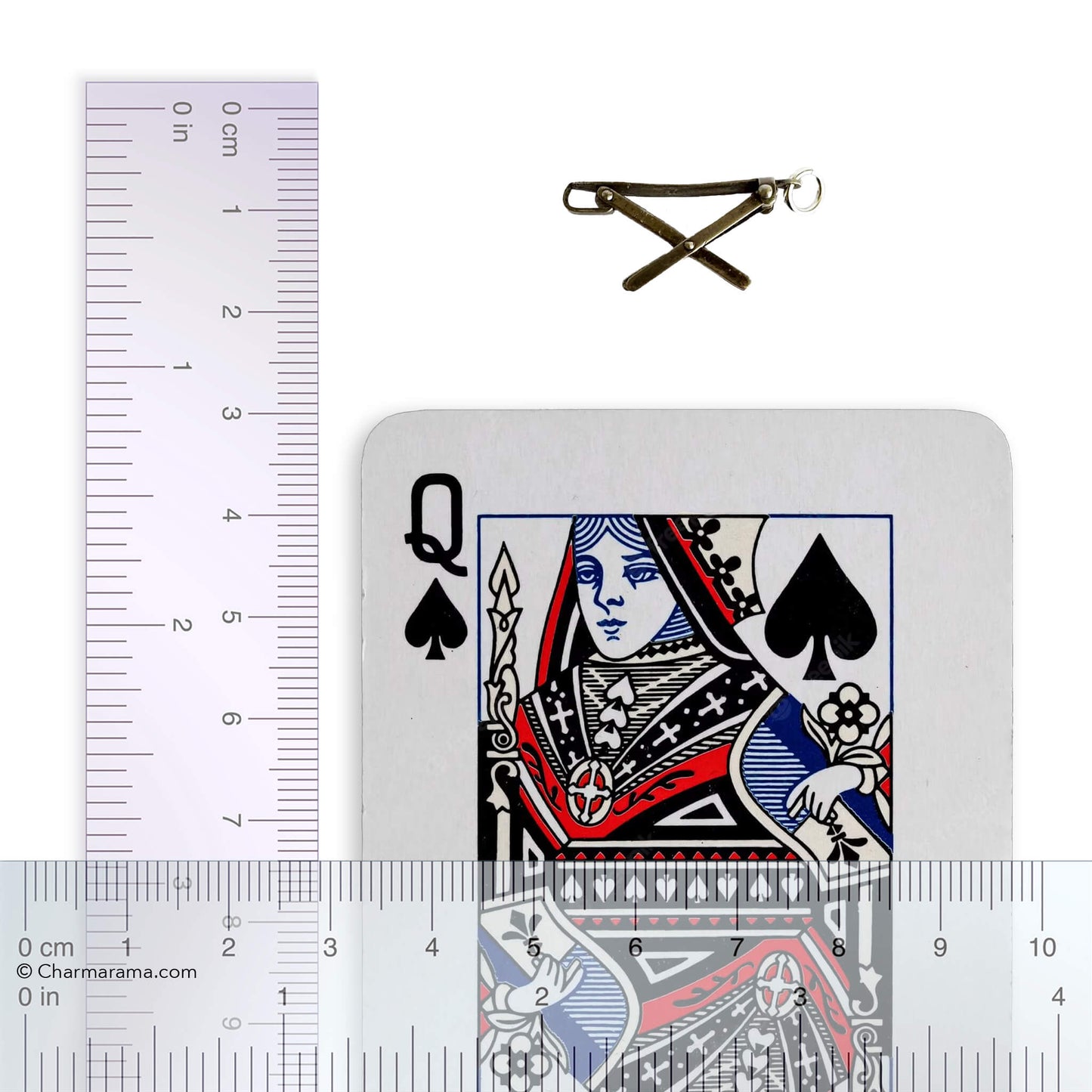 silver ironing board charm with playing card and ruler for scale