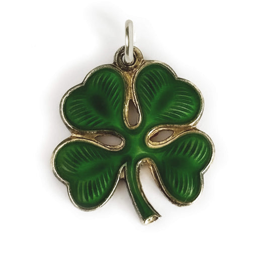 Green four-leaf clover pendant on a white background