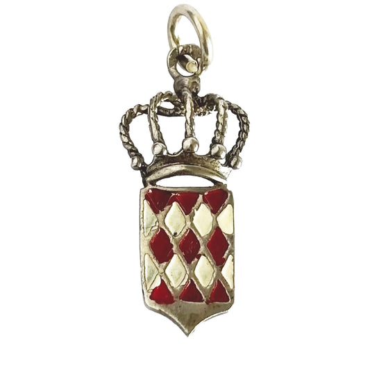 Silver and enamel Monaco flag and crown charm on a white background