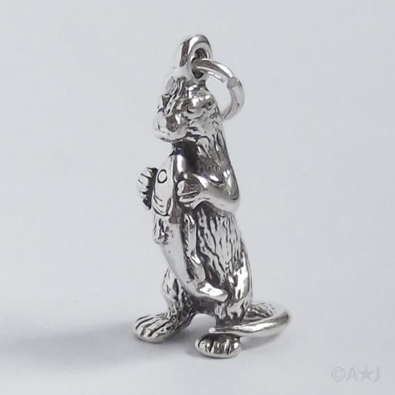 otter with fish charm