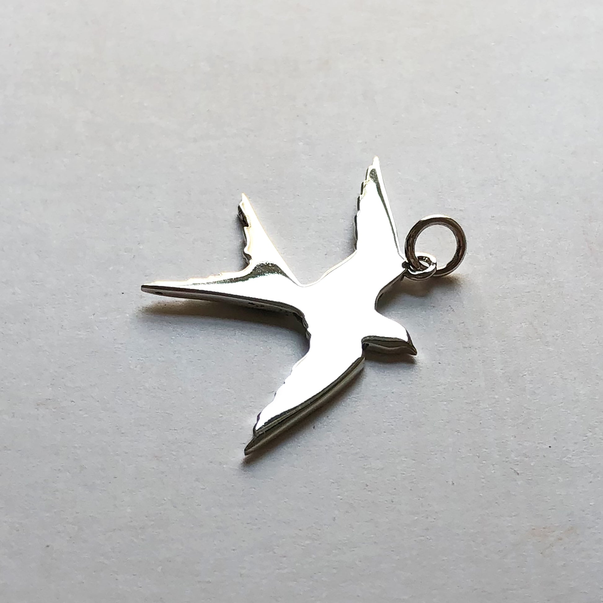 Flying swallow bird charm sterling silver pendant