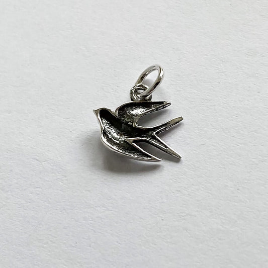 Sterling silver reverse bird charm