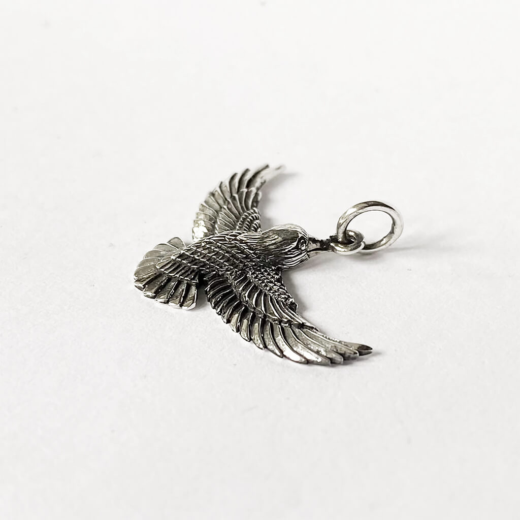 Bird in flight flying charm side sterling silver